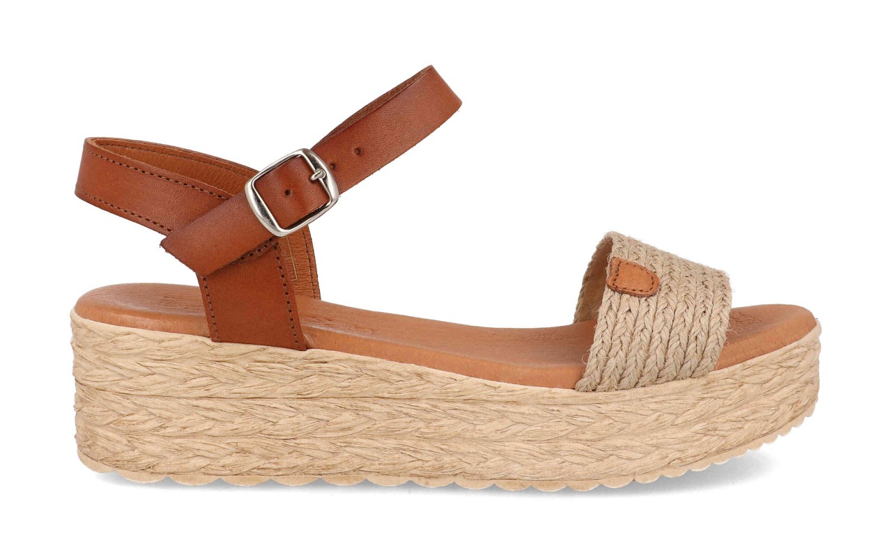 Sandalia de plataforma para mujer modelo 225 con banda ancha de yute trenzado y tira de tobillo en piel color marrón.
