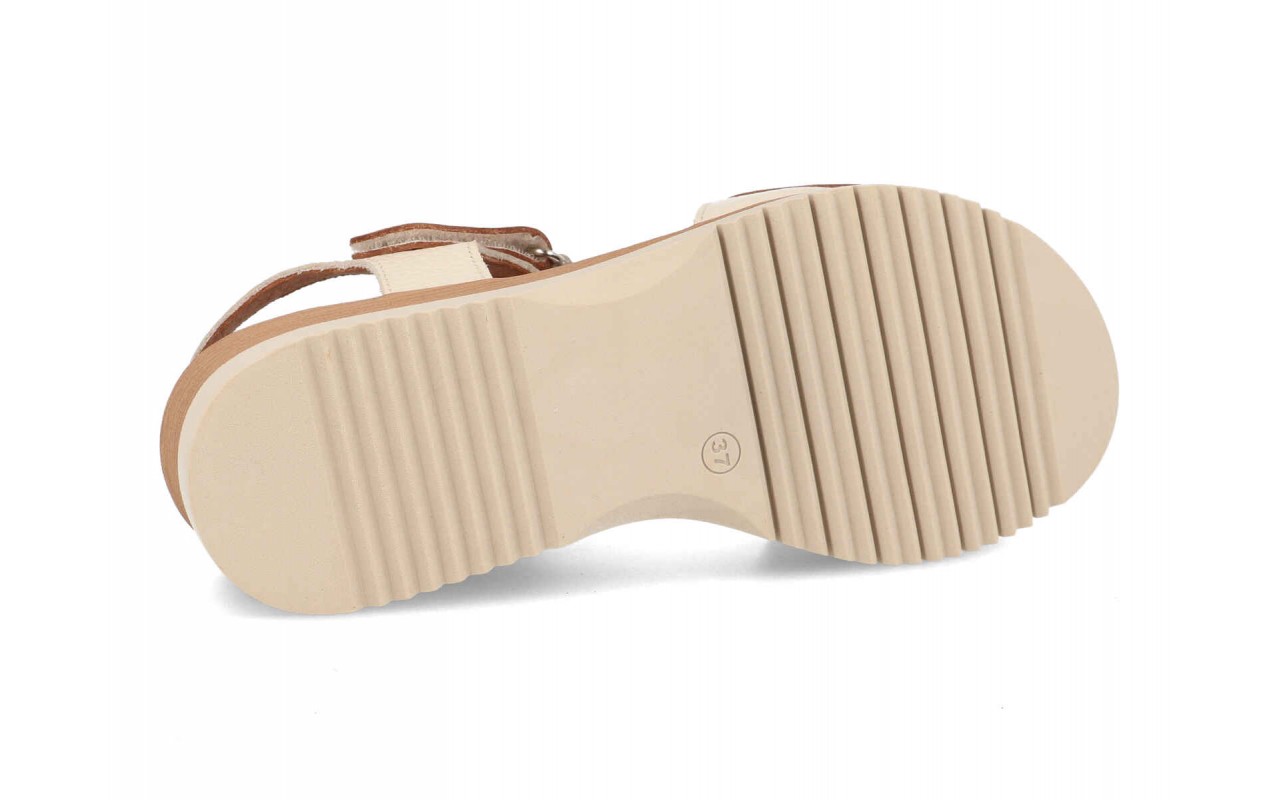 Sandalias de cuña para mujer modelo 8001 en color blanco con detalles en color cuero y suela dentada.