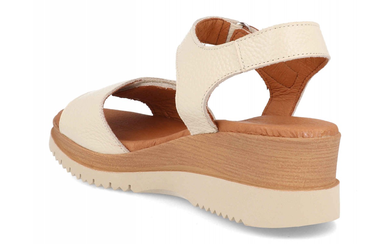 Sandalias de cuña para mujer modelo 8001 en color blanco con detalles en color cuero y suela dentada.